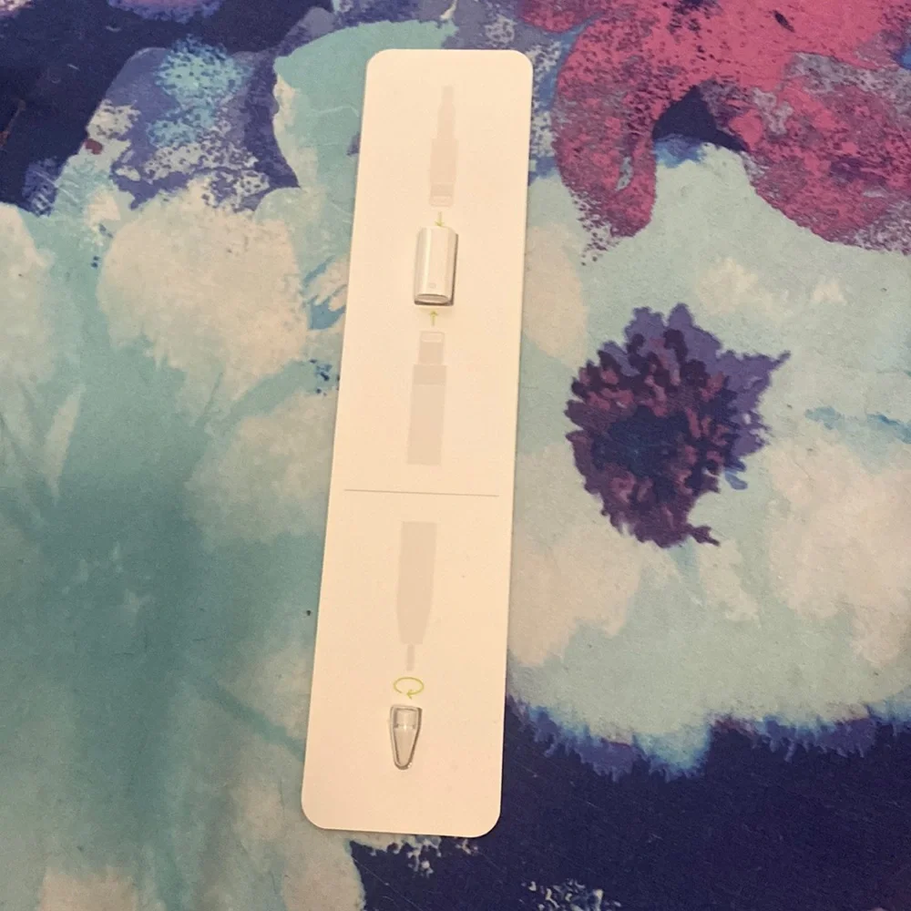 This is an Apple Pen adapter and Apple pen cap